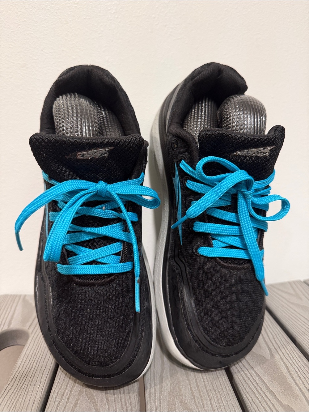 Altra Black Athletic Shoes with Bright Blue Laces